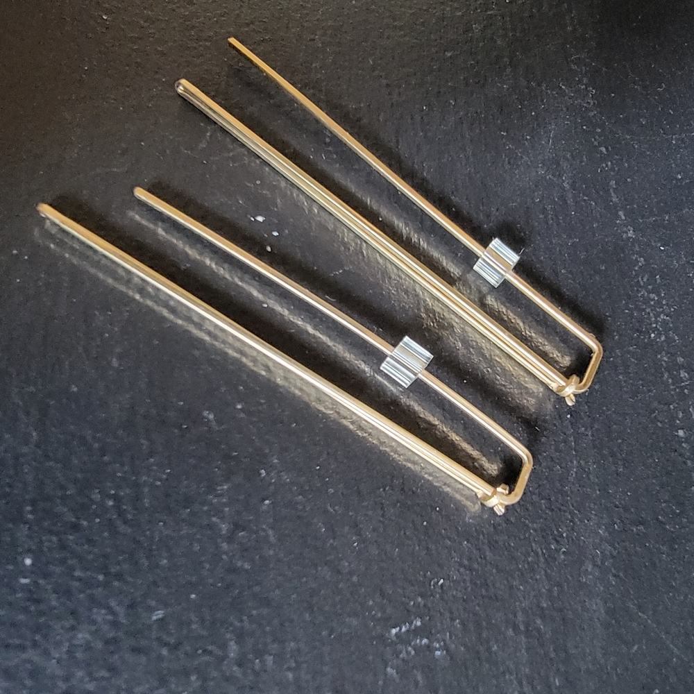 Gold thread through earrings